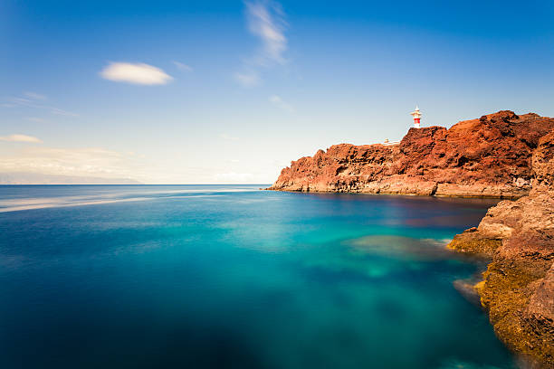 farol e mar nas ilhas canárias - clear sky spain tenerife canary islands imagens e fotografias de stock