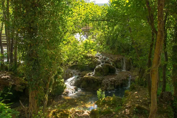 The River Una below Milancev Buk waterfall at Martin Brod in Una-Sana Canton, Federation of Bosnia and Herzegovina. Located in Una National Park, it is also known as Veliki Buk or Martinbrodski