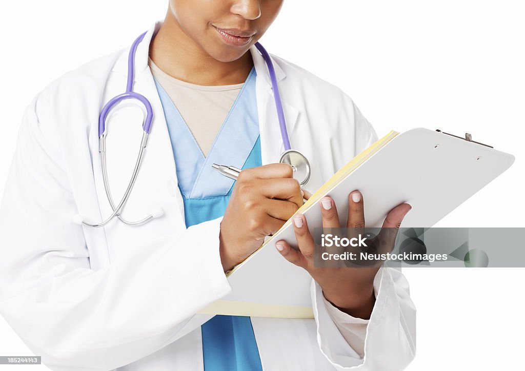 Medico scrivendo a prognosi-isolato - Foto stock royalty-free di Adulto