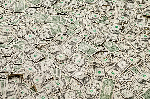 Money Background Thousands of US one dollar bills - Please see my portfolio for other money and finance related images. american one dollar bill photos stock pictures, royalty-free photos & images