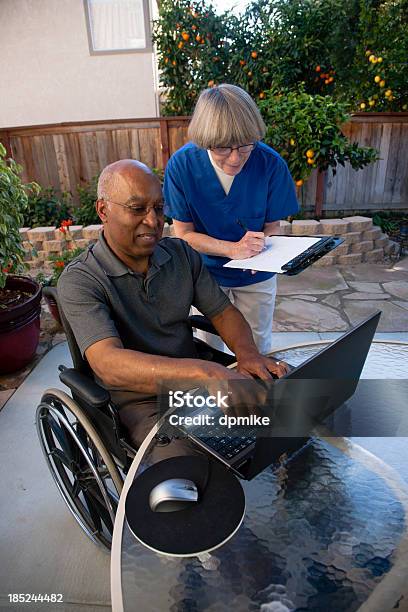 Healthcare Worker Helping Disabled Senior Stock Photo - Download Image Now - Ada Township - Michigan, 70-79 Years, Active Seniors
