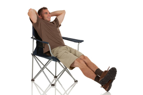 istock Man resting in a folding chair 185245059