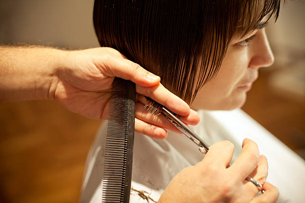 Haircut Cutting hair at the hair studio bobbed hair stock pictures, royalty-free photos & images