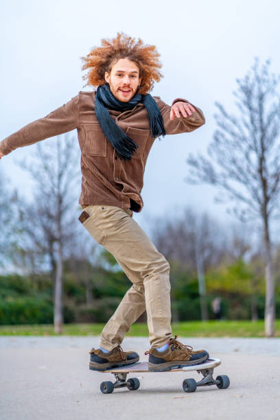 istock Balance in a skate board in a urban park 1852452220