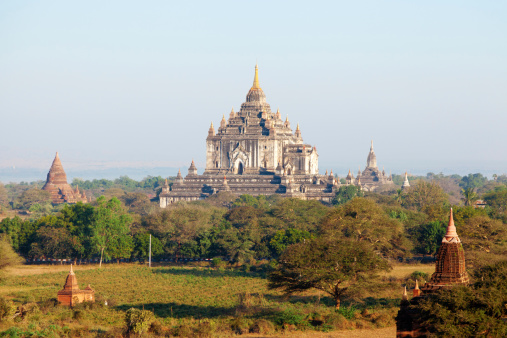 Ancient pagodas in Bagan, blue sky in background