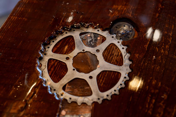 Old Gears made of copper or brass isolated on white. Macro shot.