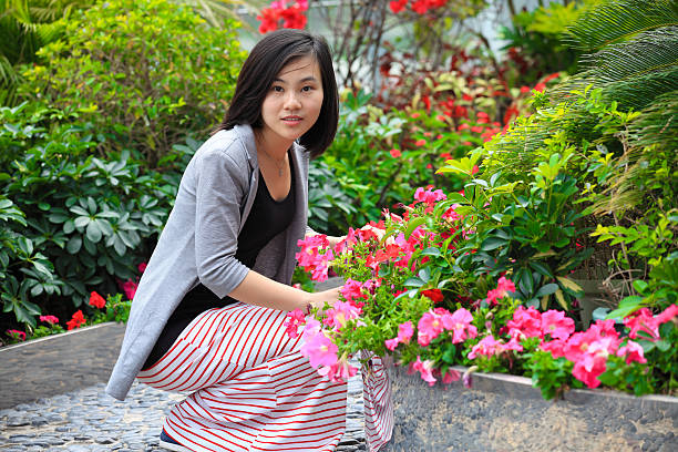 istock Smiling Asian beauty in the park 185245997