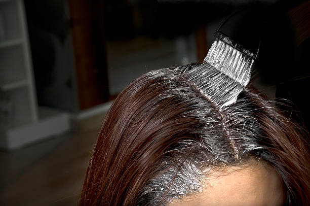 Hair coloring at the hairstudio stock photo