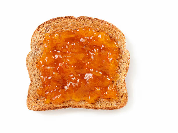 apricot jelly auf toast - toast preserves breakfast bread stock-fotos und bilder