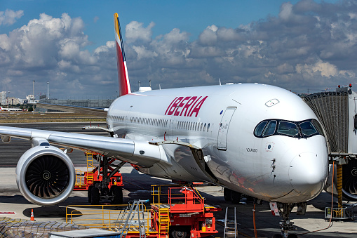 Madrid, Spain: May 31, 2023: An Iberia Airbus A350-900, a large new-generation wide-body aircraft ideal for long-range travel, parked and ready to take off and begin a journey.