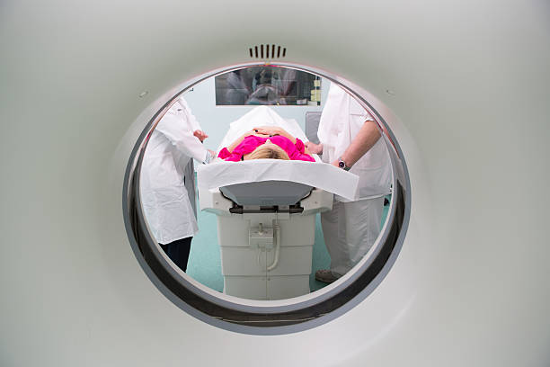 istock Young woman patinet waiting for CAT scan 185248320
