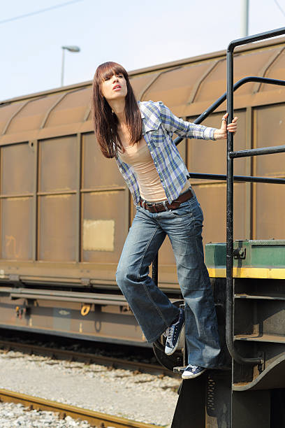 istock Pretty girl on a freight train 185248569