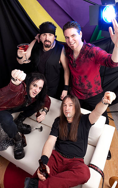 istock Four Partying Rockstar Guys 185248611