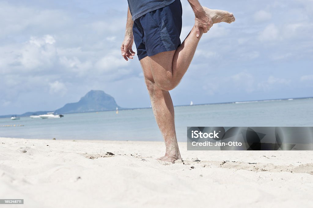 Dehnung des Quadrizeps - Lizenzfrei Insel Mauritius Stock-Foto