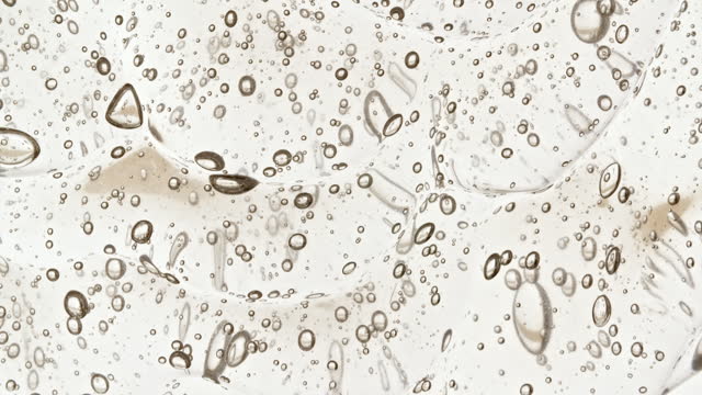 Macro shot of various air bubbles. Super slow motion Beauty glossy  bubble blobs. High quality 4k footage