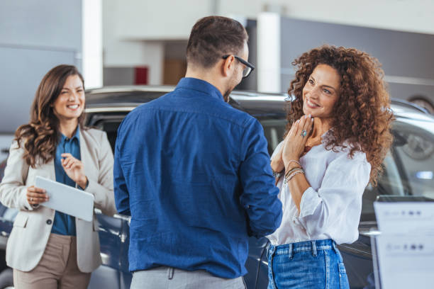 istock Millennial family selecting modern automobile 1852490792