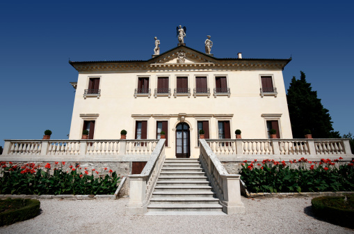 Villa Valmarana ai Nani, Vicenza (ITALY) - The Villa includes the Palazzina (1657), the Foresteria (Guest House) and Scuderia (Stables) built by Francesco Muttoni in 1720. It gets its name from the statues of the 17 dwarfs on the walls surrounding the house, most likely from the drawing by Giandomenico Tiepolo. The legend tells of a dwarf princess who lived secluded in the villa surrounded by dwarfs. Upon seeing a beautiful prince in the garden, she realized her handicap and threw herself from the tower. The pain the dwarfs felt for the princess transformed them into statues of stone.