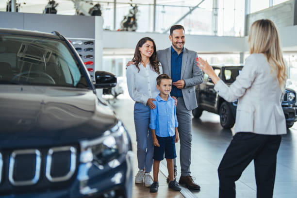 istock Millennial family selecting modern automobile 1852496219