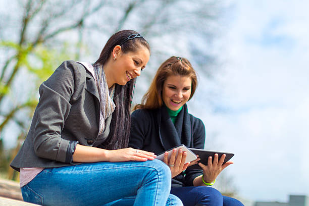 istock Best friends online with digital tablets 185249769