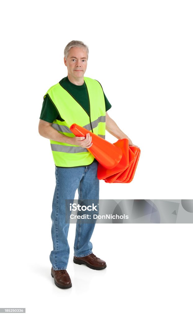 Trabalhador segurando Cones de trânsito - Foto de stock de 30 Anos royalty-free