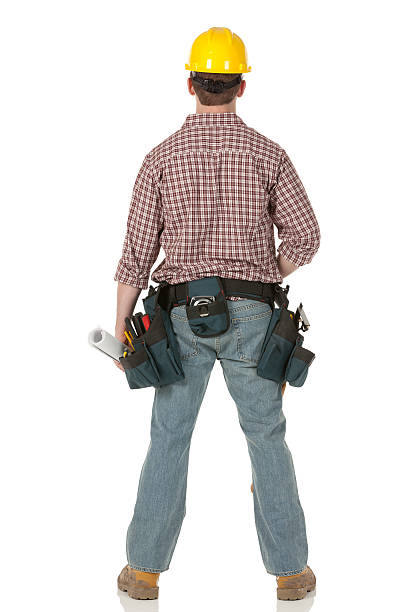 istock Rear view of a construction worker standing 185251260