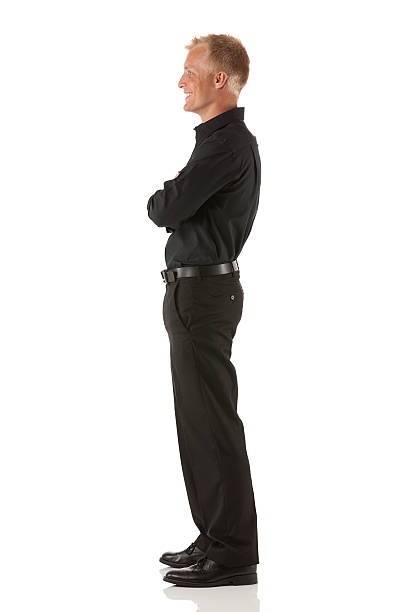 istock Businessman standing with his arms crossed 185251484