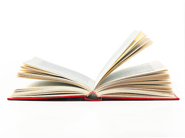 istock An open book with red cover on a white background 185252460