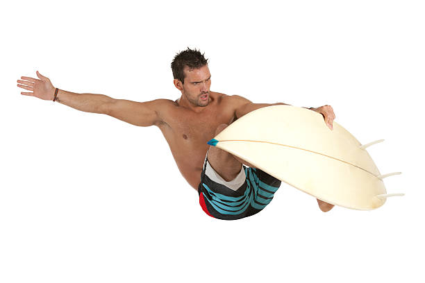 Male surfer in action Male surfer in actionhttp://www.twodozendesign.info/i/1.png unbalance stock pictures, royalty-free photos & images
