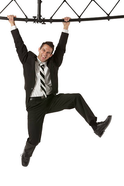 istock Businessman hanging with a metal structure 185253561