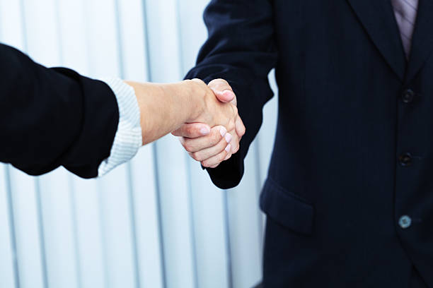 istock Business Meeting Welcoming Handshakes 185253671