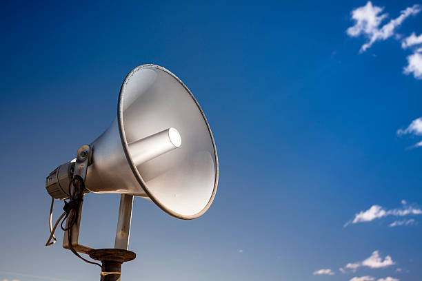 Loudspeakers broadcast a message Announcement communication over a megaphone speaker public address system stock pictures, royalty-free photos & images