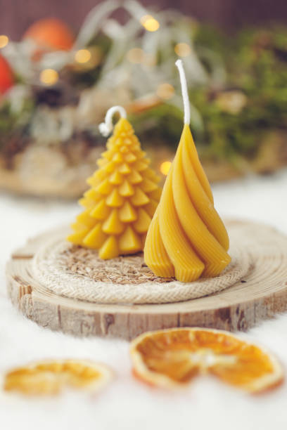 istock Bee wax candles on white background 1852543750