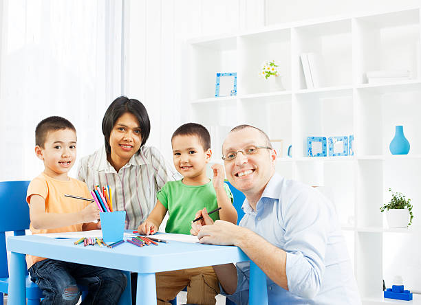 istock Diverse family Having Fun coloring book. 185254717