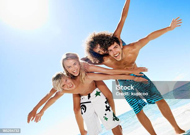 Flying With The Freedom Of Youth Stock Photo - Download Image Now - Adolescence, Adult, African Ethnicity