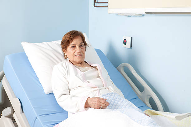 istock Senior Patient and Healthcare Workers 185255031