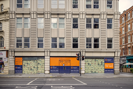 New Oxford Street, London, England - October 29th 2023:  Closed and bankrupt shop in an English street