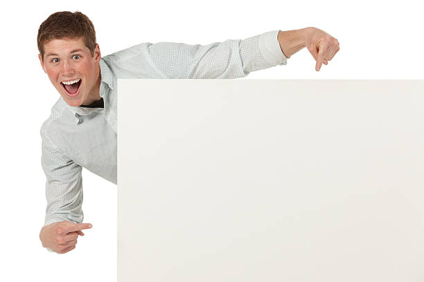 istock Excited man pointing at a placard 185255296