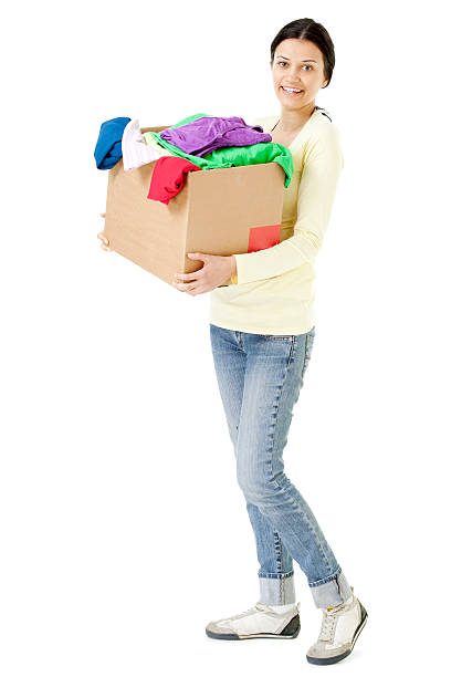 istock woman holding donation box 185255317