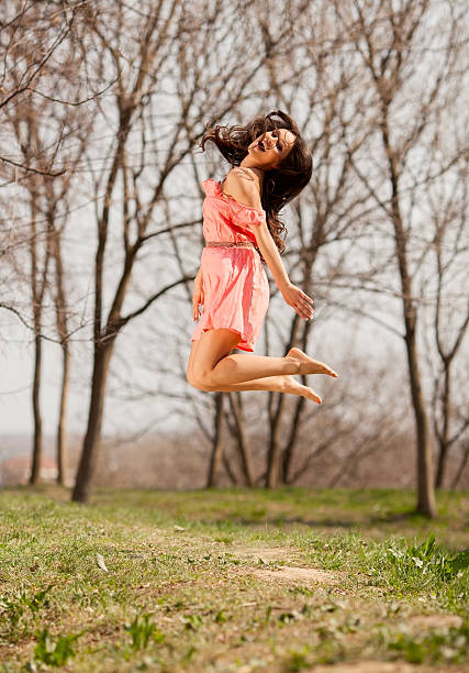 istock Young beautiful woman in jump. 185255370