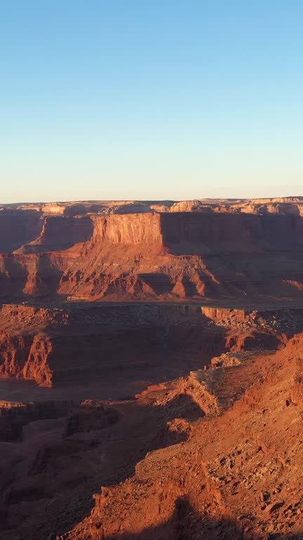 Dead Horse Point State Park at Sunrise. Utah, USA. Aerial View.. Vertical Video