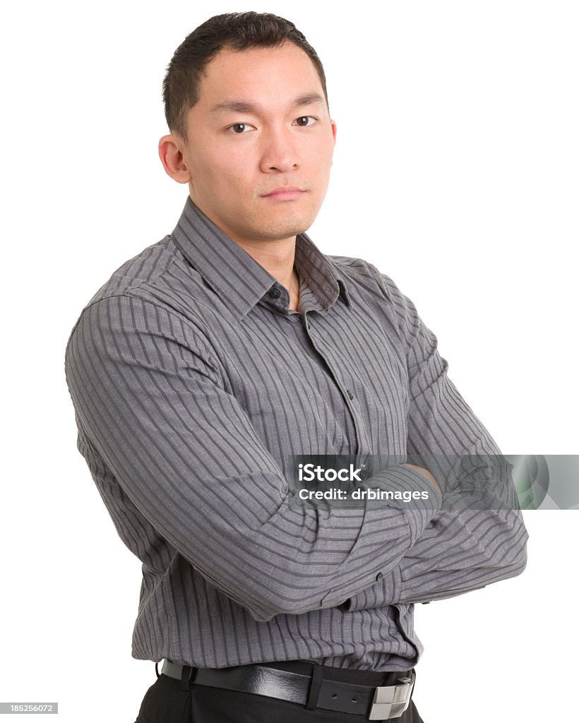 Man crossing his arms looking stern Portrait of a young man on a white background. http://s3.amazonaws.com/drbimages/m/pg.jpg Cut Out Stock Photo