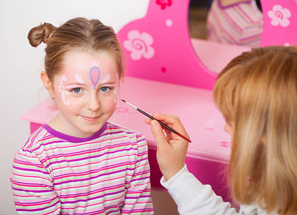 istock Girl with painted face 185256138