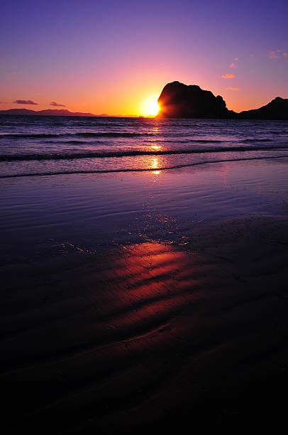 istock beautiful silhouette sunset at tropical sea 185256199