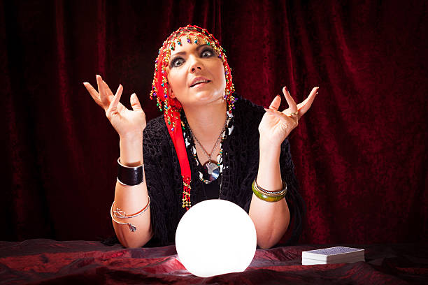 istock crazy fortune teller with crystal ball 185256288