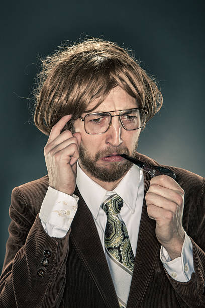 istock Portrait of Nerdy Scholar in Corduroy Jacket, Thinking 185256452
