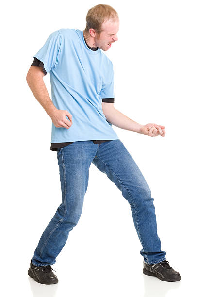 Man Playing Air Guitar Portrait of a man on a white background. http://s3.amazonaws.com/drbimages/m/sk.jpg air guitar stock pictures, royalty-free photos & images