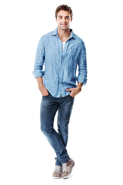 istock Smiling man standing with ankles crossed 185257770