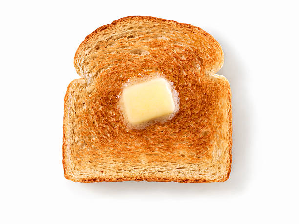 таять масло на белом тосте - butter toast bread breakfast стоковые фото и изображения
