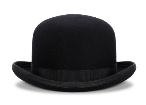 This is a photo of a black bowler hat isolated on a white background with a drop shadow.