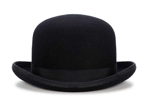 Black Bowler Hat Isolated on White This is a photo of a black bowler hat isolated on a white background with a drop shadow. bowler hat stock pictures, royalty-free photos & images